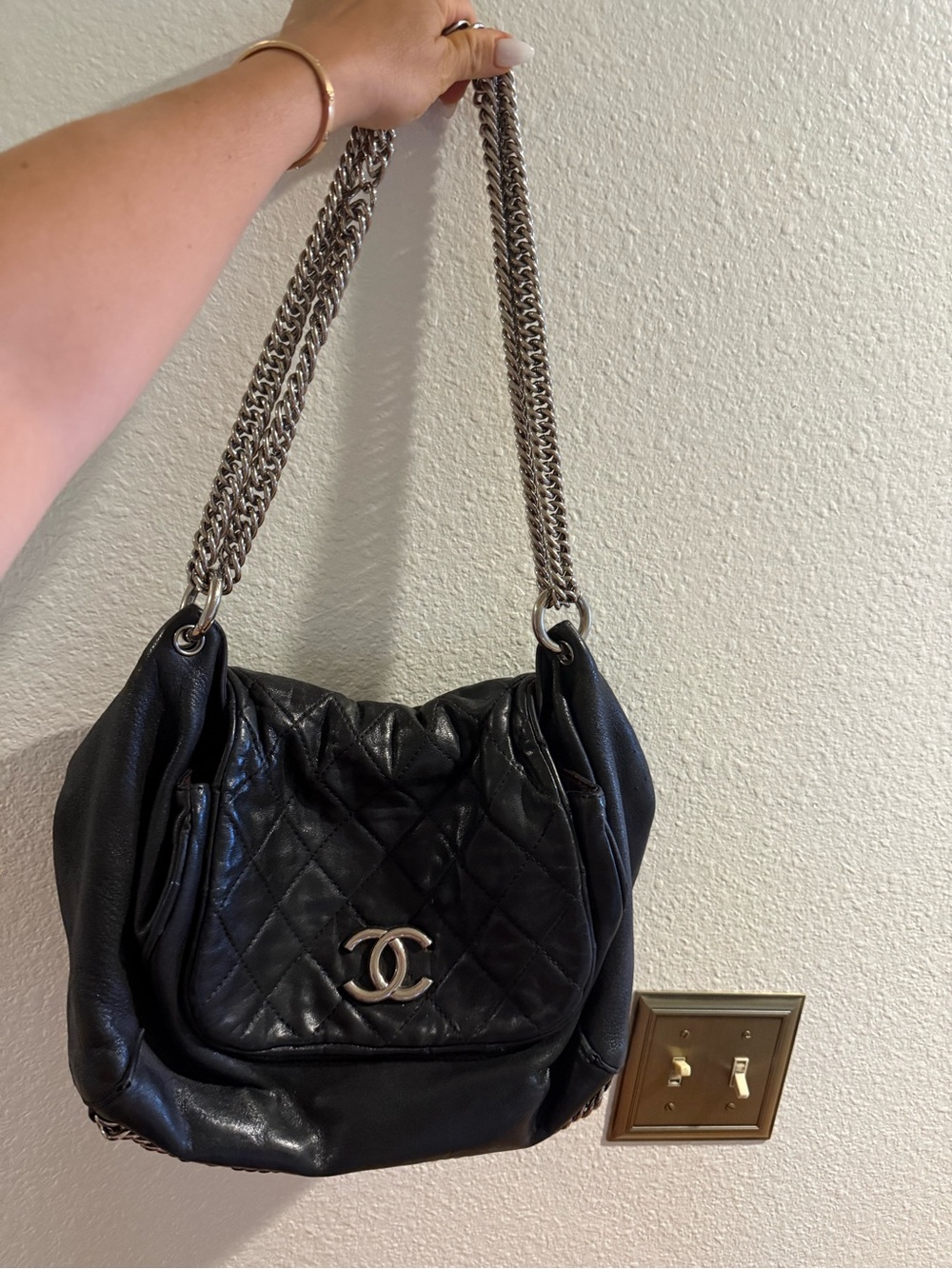CHANEL Black Quilted Leather Shoulder Bag with Silver Chain Strap